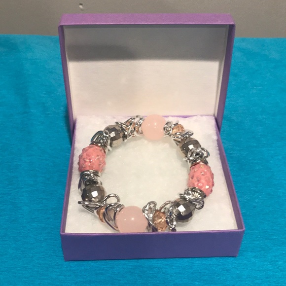 Bracelet, stretch, glass 6in Pink Rondelle - Picture 6 of 6